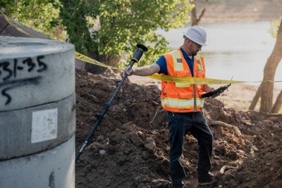 surveyor collecting data without leveling the rod